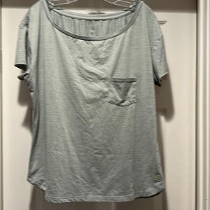 Vuori women’s top in sage green